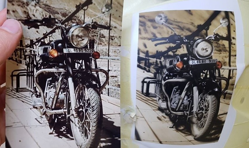 Airbrushed Painting of a Touring Helmet with image of a motorbike on a scenic road paintied like a poleroid photo